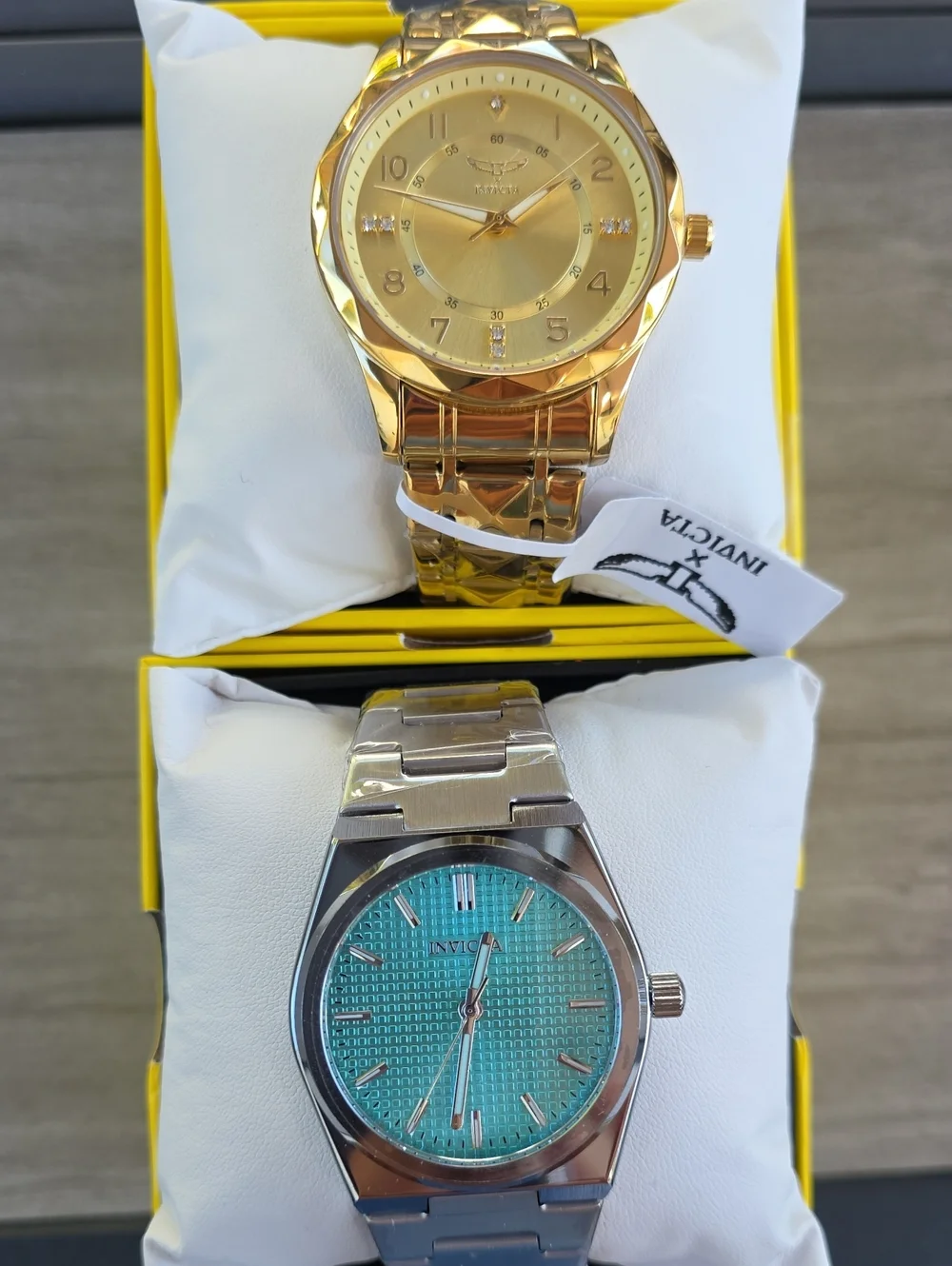 743. Pair Of Invicta Men's Gold and Silver/Aqua Watch Set